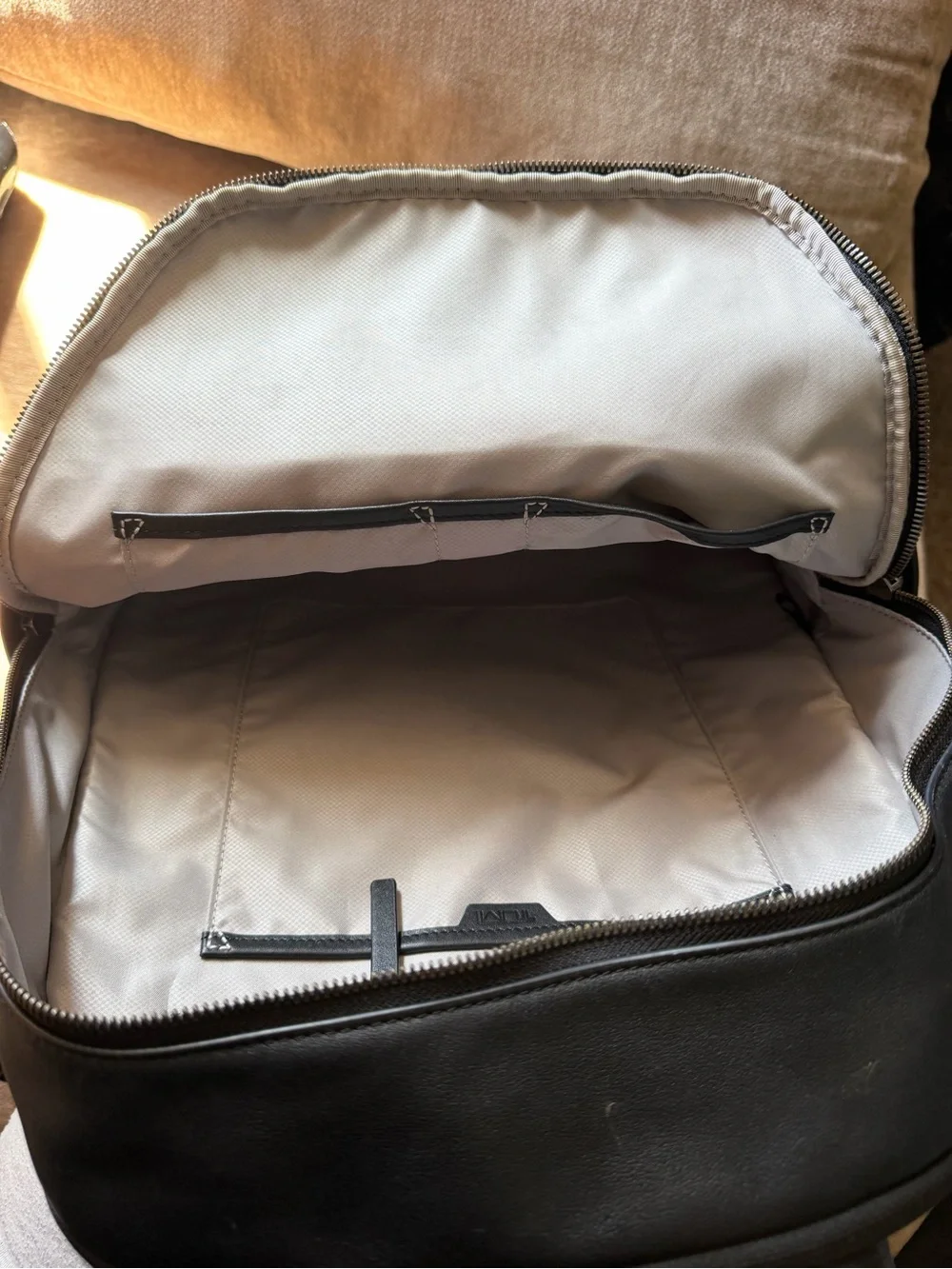 Tumi Black Leather Men's Backpack with Front Zip Pocket